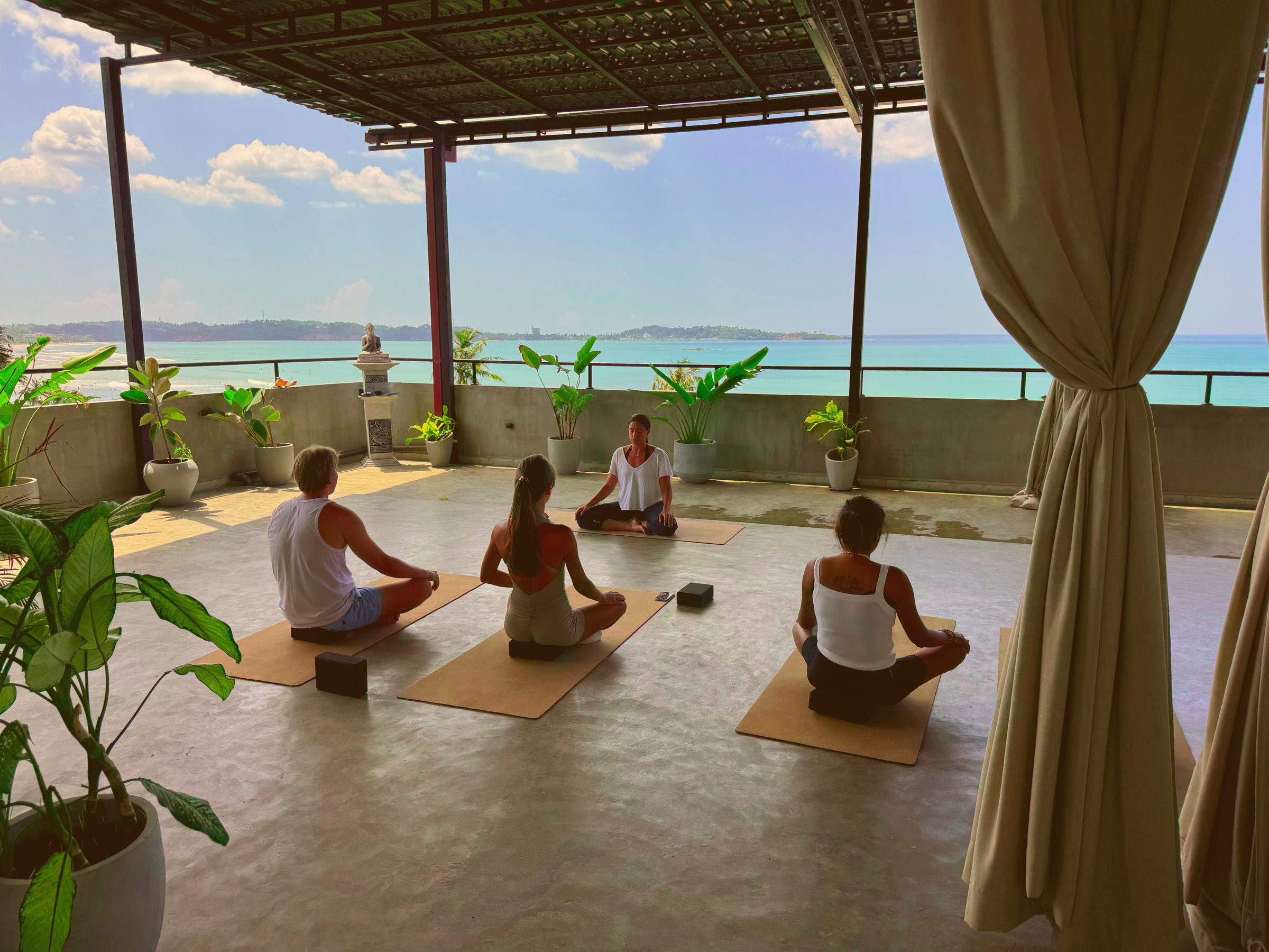 Calma Samaya rooftop wellness space with ocean view in Weligama